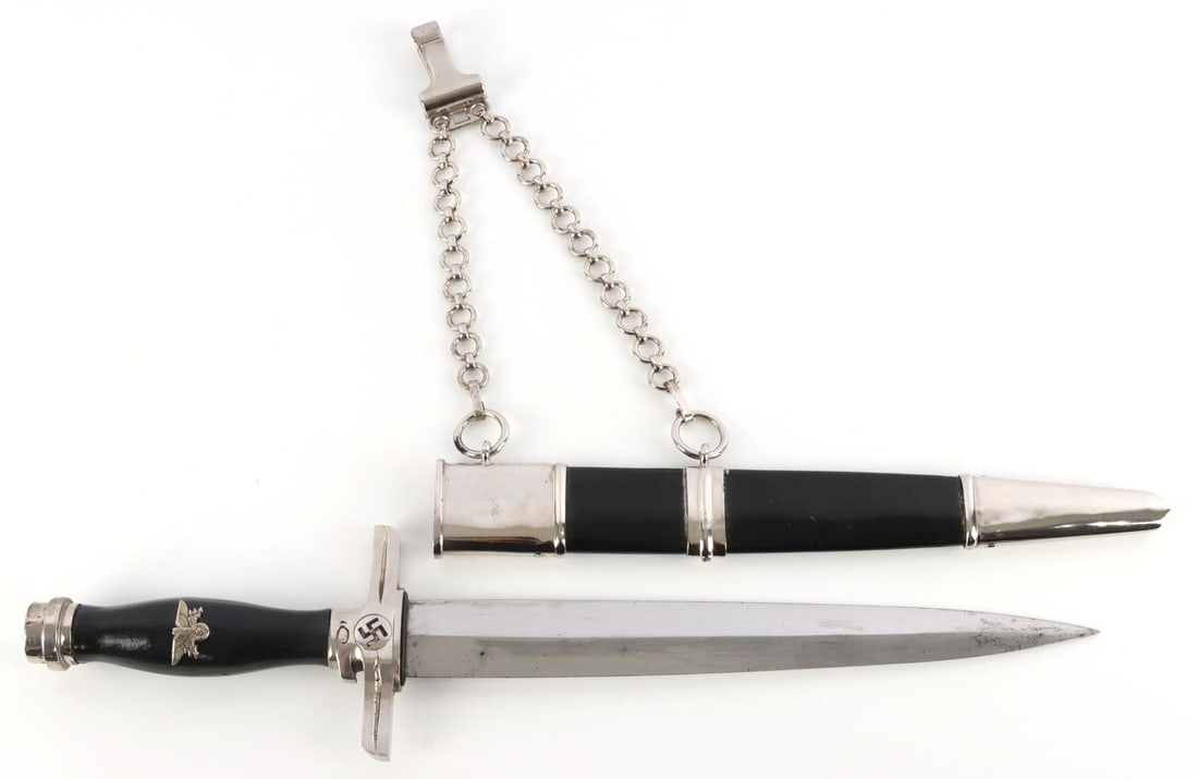 WWII GERMAN REICH POSTAL LEADER DAGGER: Steel blade with no maker's mark. Tang marked "Weyersburg". Crossguard both plated, grip is wood. All nickel fittings. 15 3/8 inches. Purchase from Epic Artifacts. This lot has a reserve.