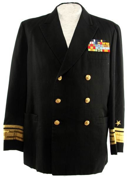 US NAVY NAMED REAR ADMIRAL TUNIC C.1970S: Black tunic with ribbon board (Navy Cross, Navy Distinguished Service, Silver Star, Navy and Marine Corps with two bronze service stars, American Defense Service with "A" device, WWII Victory, America