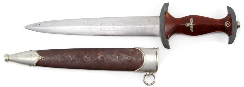 WWII GERMAN SA DAGGER SCHUTTELHOFER & CO: WWII German SA dagger, RZM coded "M7/13" (Artur Schuttelhofer & Co, Solingen). "Alles Fur Deutschland" slogan on blade. Loss to most of finish on holt fittings, and some spotting to blade. Some pittin