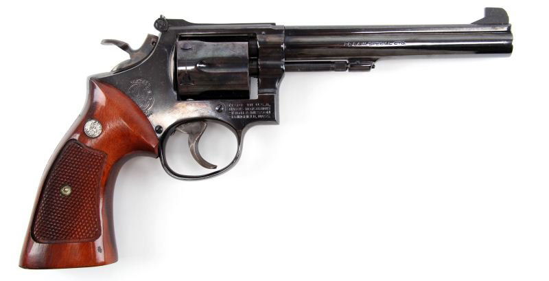 SMITH & WESSON MODEL 14-3: Smith & Wesson Model 14-3 K38 Target Masterpiece revolver. 6 inch barrel with blued finish, and factory S&W grips. Bore is perfect, and finish is 99%. A few mild handling marks visible on grips, but o