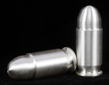 LOT OF 2 .999 FINE SILVER .45 CALIBER BULLETS