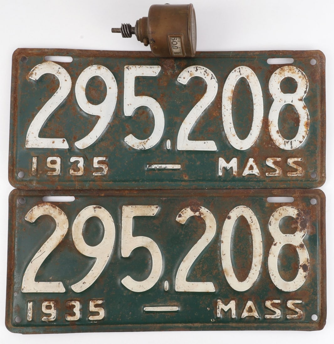 ANTIQUE LOT 1 AUTO METER + 2 1935 LICENSE PLATES: 3-piece antique automobile parts lot. Includes one (1) brass Auto-Meter by Warner Instrument Co. and two (2) matching 1935 Massachusetts license plates. Heavy rust present to plates, but they are full