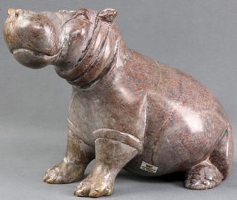 POLISHED STONE SEATED HIPPOPOTAMUS FIGURE