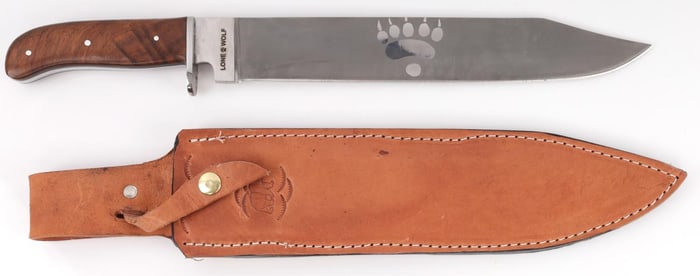 LONE WOLF CARVED POLISHED STEEL BOWIE KNIFE