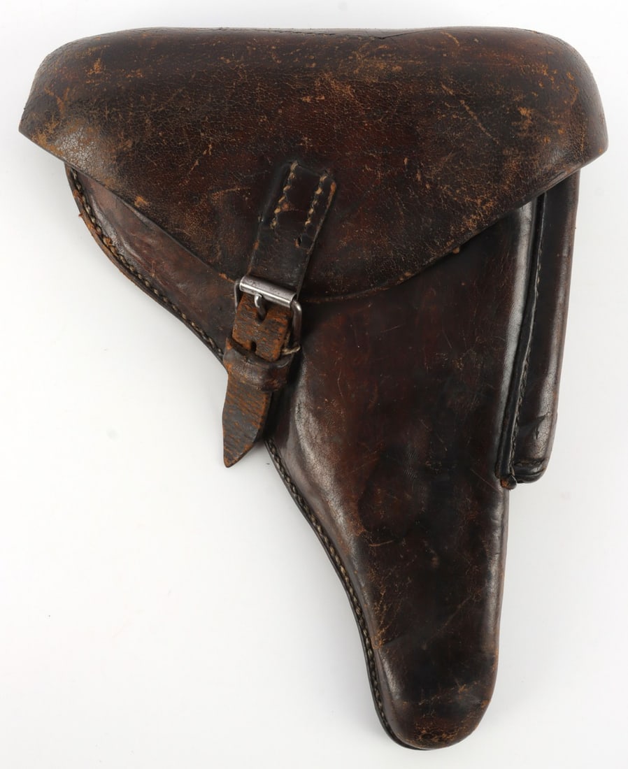 WWII GERMAN THIRD REICH HOLSTER FOR LUGER P08: Holster for the Luger P08 Parabellum-Pistole. The holster is stamped for Karl Barth, with a Waffenamt, and is dated to 1939. There are some scratches on the leather, but overall the surface of the hol