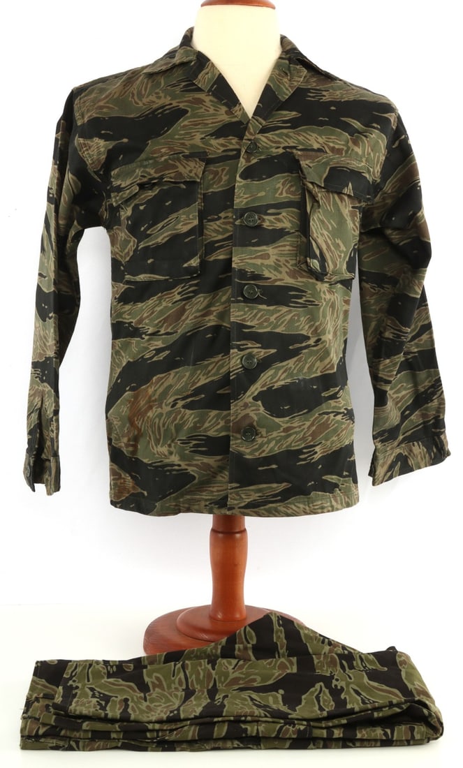 VIETNAM WAR US TIGER STRIPE CAMO SHIRT & PANTS: Vietnam War tiger stripe gabardine uniform shirt and pants. Shirt has ink stamp "A-M." Pants have ink stamp "L." Good conditon. Right front shirt pocket button is split.
