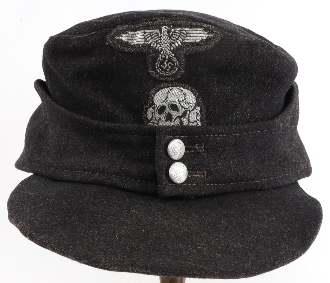 WWII GERMAN SS PANZER DIVISION M43 CAP MUTZE: Does not fluoresce. Moth-free. Euro size 58. Dated 1935. Some internal sweat stains. Overall, in very good original condition. This lot has a reserve.