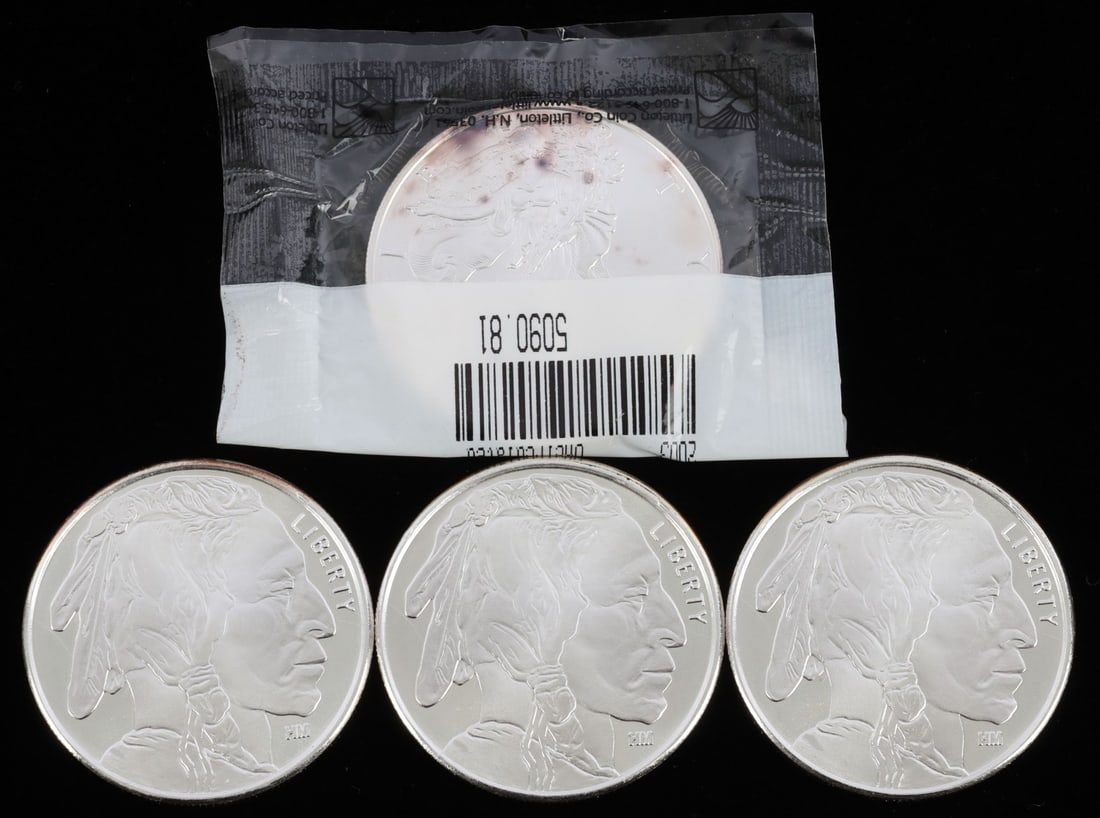 1 2003 SILVER AMERICAN EAGLE & 3 BUFFALO ROUNDS: Each is 1 Troy ounce, for a total of 4 ounces.
