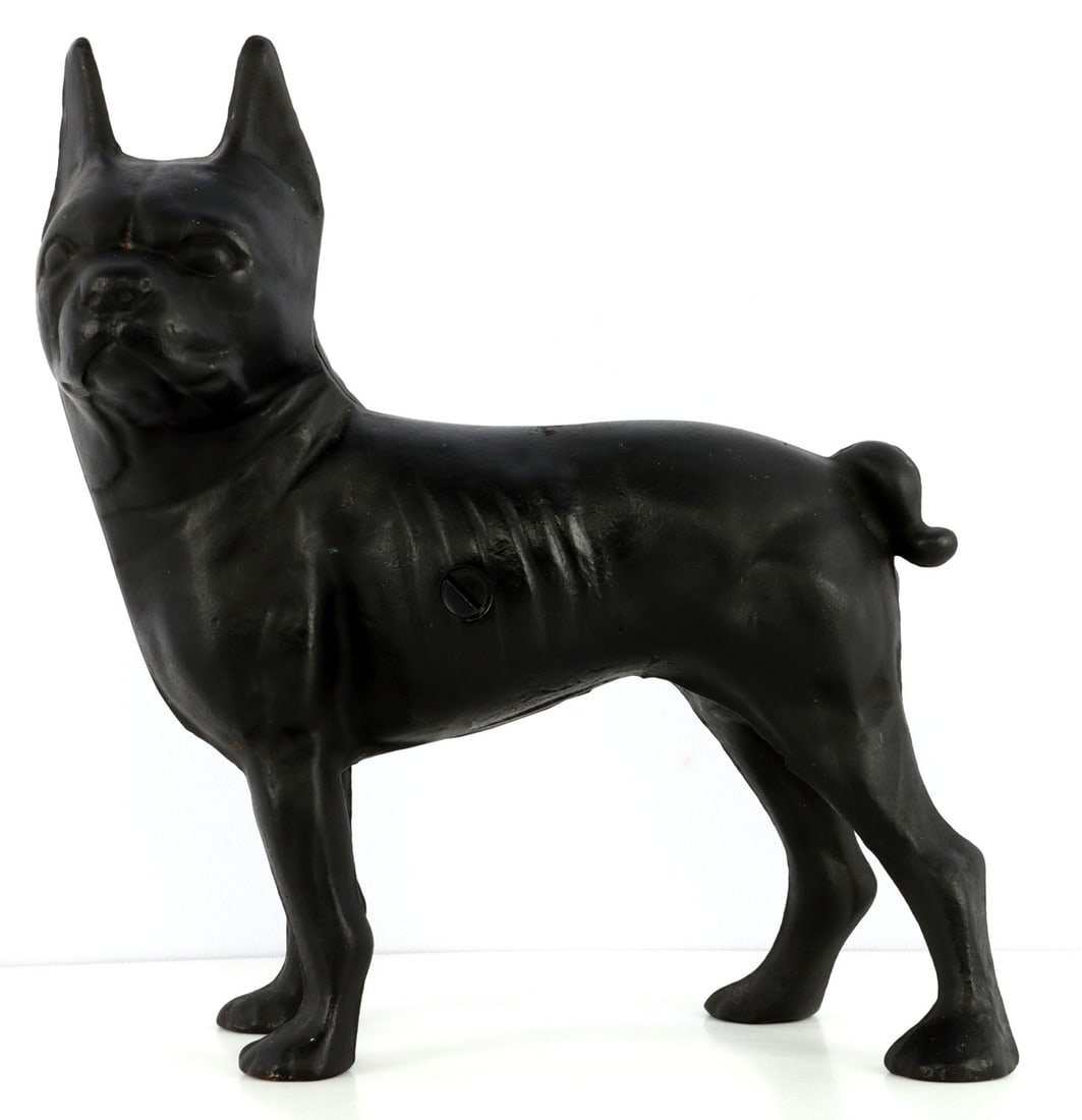 CAST IRON PITBULL DOORSTOP TYGE BUSTER BROWN: Cast iron pitbull door stop. This cast iron pitbull has superficial similarities to the Hubley Boston terrier cast, but there are subtle differences indicating a unique mould was used; likely, this fi