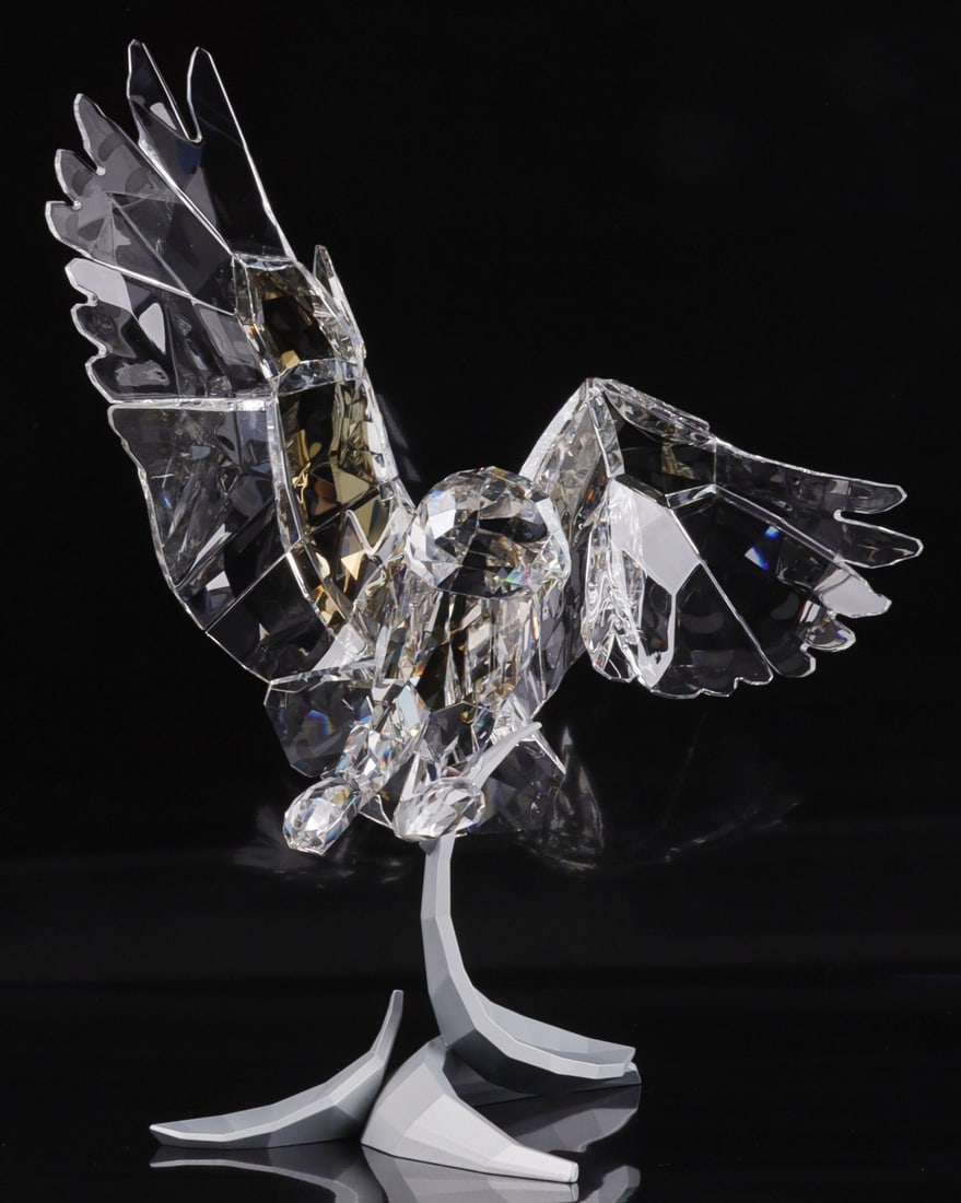 SWAROVSKI CRYSTAL SNOWY OWL SOULMATES: Swarovski crystal owl statue named 'Snowy Owl,' part of the Soulmates series. Crafted wotj Swarovski crystal and metal. Swan logo on bottom. This statue comes with gloves, cleaning cloth, and original