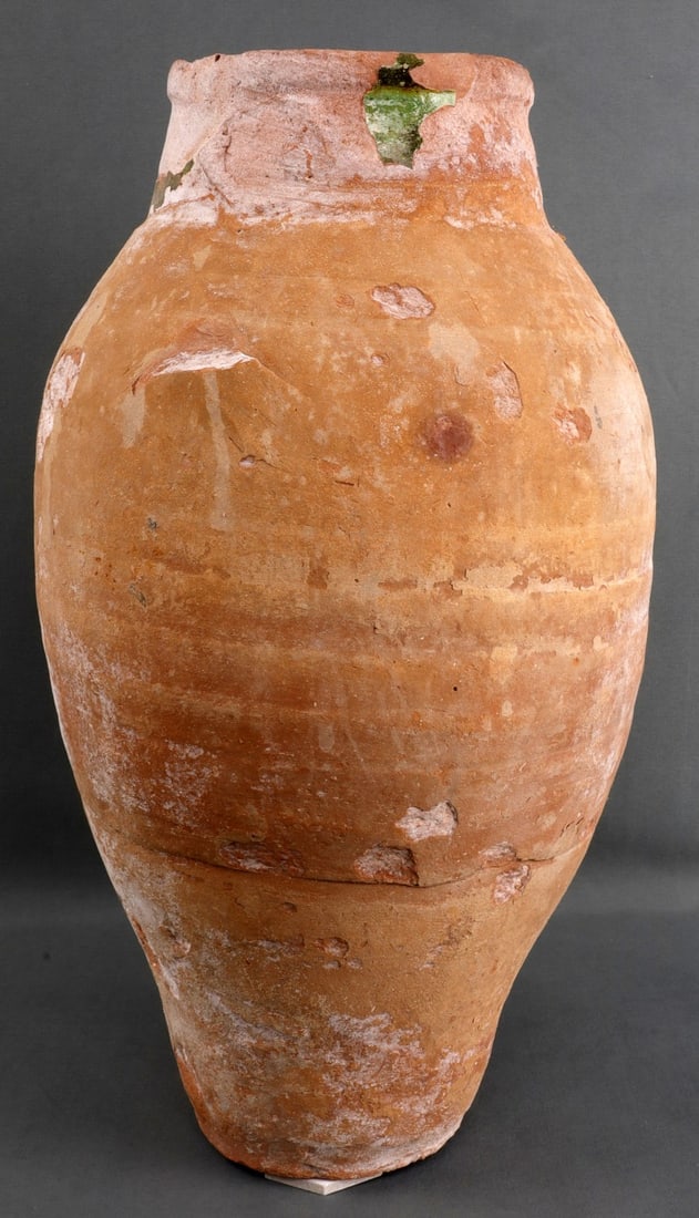 AEGEAN RECOVERED ANCIENT ROMAN CLAY POTTERY JAR: Circa 13th to 15th century Byzantine Empire clay pot recovered from an Aegean shipwreck. Opening has 5-inch diameter, height of 18 inches, and belly has 11-inch diameter. In good condition with remnan
