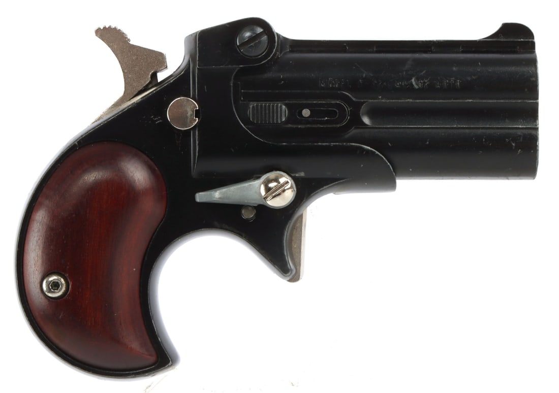 DAVIS INDUSTRIES MODEL D-32 DERRINGER CAL .32 ACP: Davis D-32 single-action, two-shot pistol. 2.5-inch barrel. Black finish with rosewood grips. Very good condition. Mechanically fine, functions without issue. Bores are bright and clear. Finish lightl
