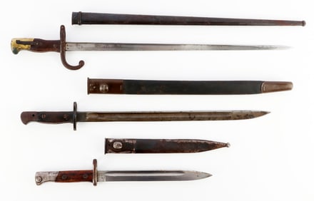 3 FRENCH BRITISH & SPANISH BAYONETS WITH SCABBARDS