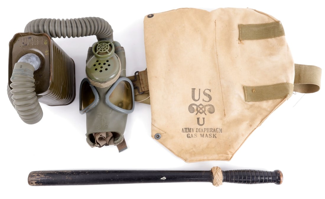 WWII US ARMY M3 DIAPHRAGM GAS MASK & POLICE BATON: Lot of TWO (2) pieces. Interior of case ink stamped "MIVAI E.A.E. Lot 61." Police baton marked "US" on butt of grip. Very good condition. This lot has a reserve.