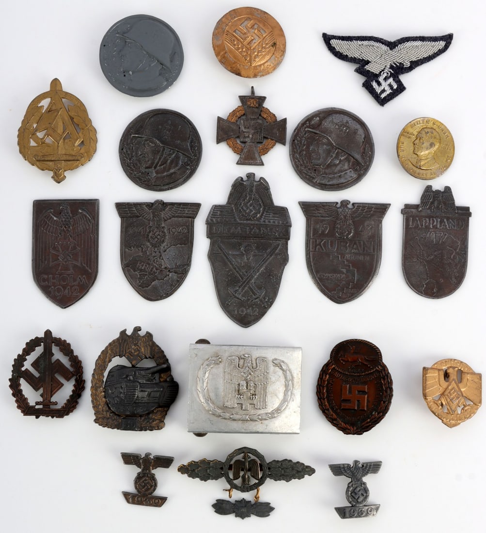 LOT OF 21 WWII GERMAN REICH BADGES MEDALS BUCKLES: Lot of TWENTY-ONE (21). Good selection of medals, badges, and campaign shields related to the Third Reich. Organizations represented include the Luftwaffe, the Heer, the SS, and the SA. In addition to