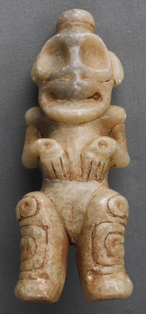 TAINO THREE DIMENSIONAL ANTHROPIC COHOBA INHALER: Taino three dimensional anthropic cohoba inhaler. Very well carved. Subject is pushing her belly and vaginal cleft occurs at the joint of the legs. The back is separated from the torso. Symbols cover 