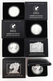 AMERICAN EAGLE SILVER PROOF LOT OF 4 2021-2024: Four proof American Eagle silver dollar coins with walking liberty design. Each is cased and boxed. Years include 2021, 2022, 2023, and 2024. This lot reserved at melt. This lot reserved at melt.