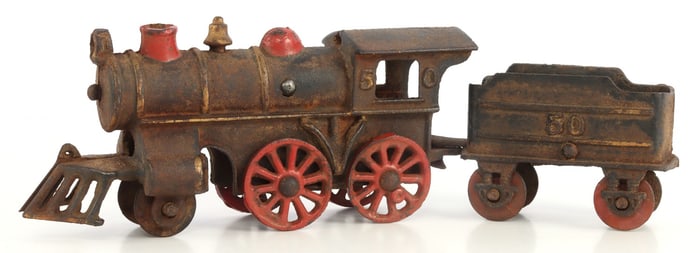 ANTIQUE CAST IRON TOY TRAIN WITH TENDER.