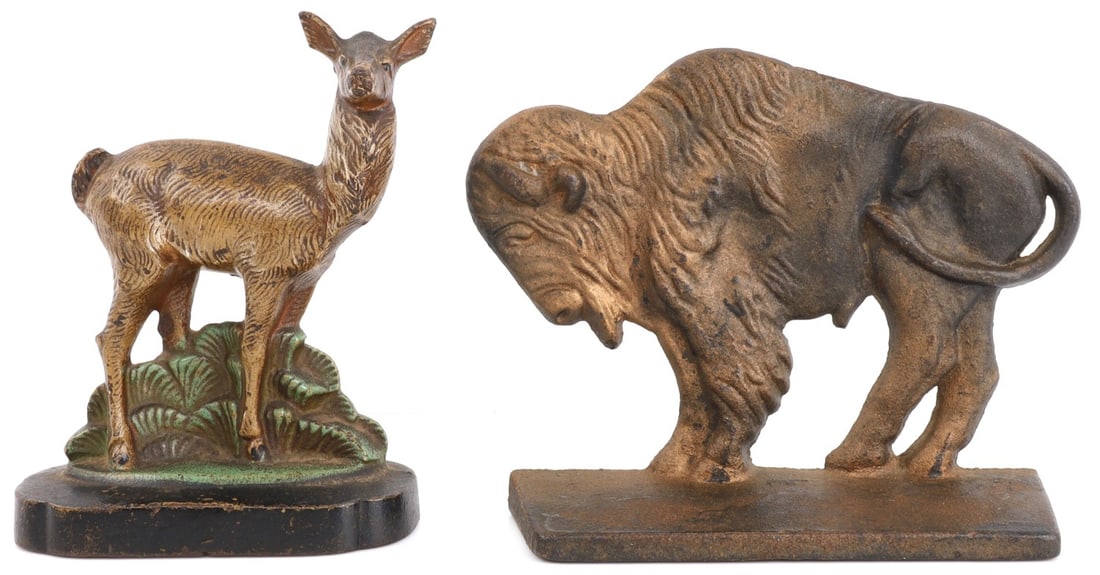 2 CAST IRON DOORSTOP LOT BUFFALO & DEER: The deer has what appears to be the number 299, on the reverse base, no other marks ion either one. Buffalo measures 6 1/2 X 5 inches, deer 4 x 5 1/2 inches.