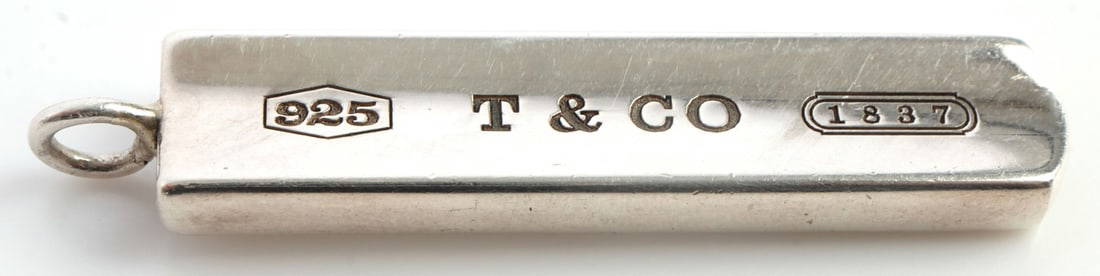 TIFFANY & CO STERLING 1837 SILVER BAR: Correct stamps. Weight: 8.5 grams. Measures 36mm.