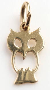 14KT YELLOW GOLD OWL PENDANT: Measures 10.46mm. Weight: .4 grams. Marked 14kt. This lot has a reserve.