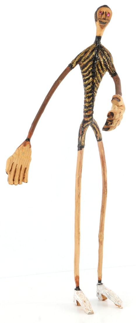 OL SAMUELS WELCOMING FIGURAL FOLK ART AMERICANA: A figural of a man extending his hand by Ossie Lee 'OL' Samuels (1931-2017). It is not immediately clear if the figure is supposed to be warm and inviting or malevolent. Wood and paint with glued on c