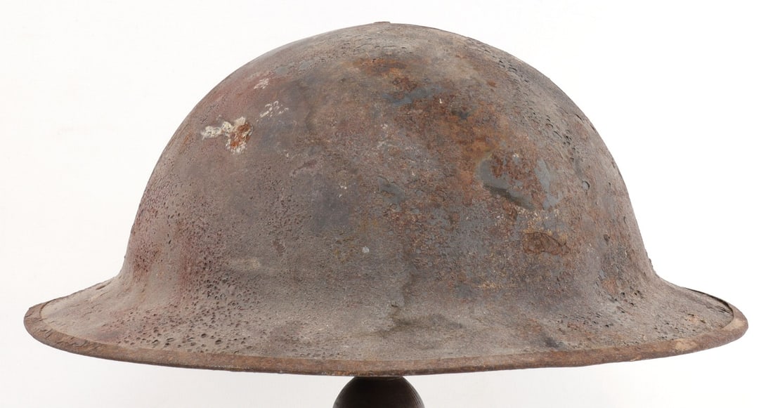 WWI AMERICAN MODEL 1917 BRODIE HELMET DOUGHBOY: Model 1917 Brodie helmet. Heavy oxidation. 11.5 X 12.5 inches. Very good, original condition.