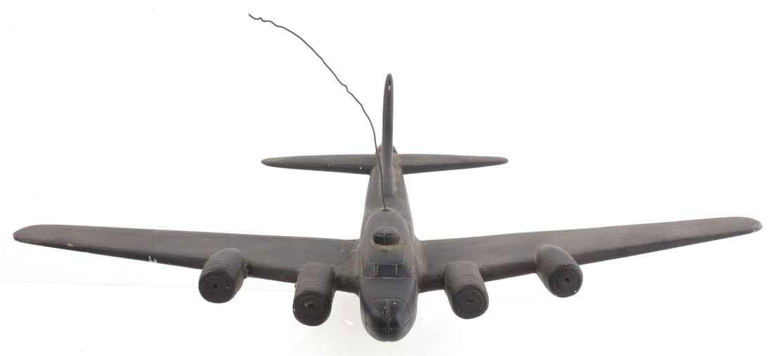 WWII B-17 BOMBER AMERICAN RECOGNITION MODEL: Celluloid acetate recognition model of a B-17 Flying Fortress. Made in 1943 in a shop class, as written on attached note. 17.25 X 13 inches. Very good, original condition.