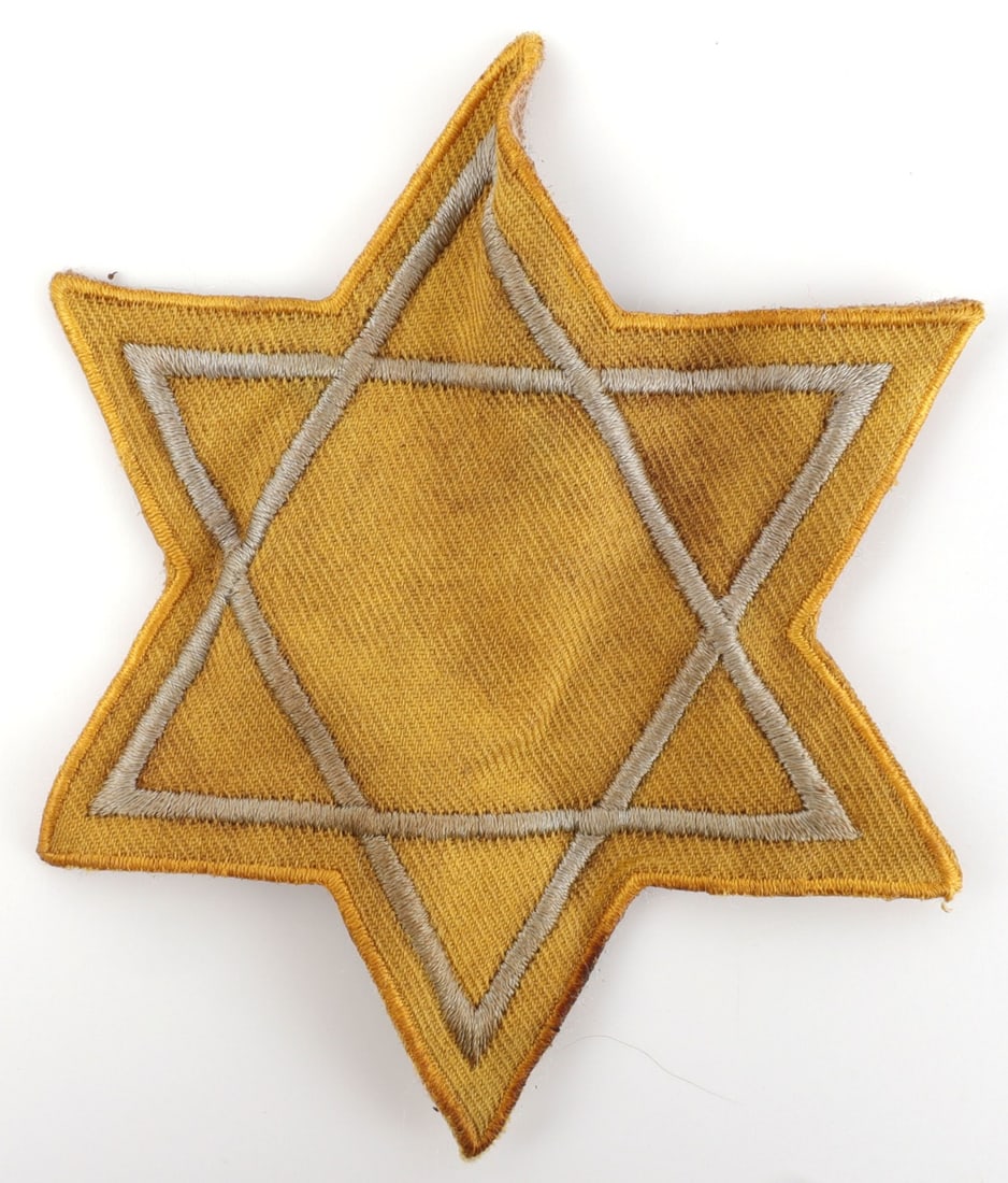 WWII GERMAN THIRD REICH STAR OF DAVID PATCH: Original Star of David patch for Jews during Third Reich Germany. Non-fluorescing. 4.25 inches.