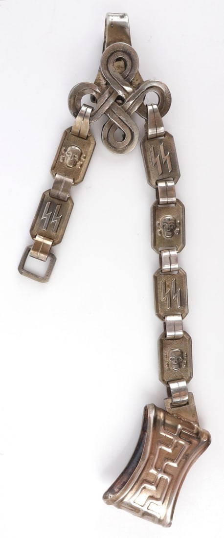 WWII GERMAN THIRD REICH SS DAGGER HANGER: Hanger for SS Honour Dagger. Has series of alternating chain links, some depicting a Death's Head and some with SS Sieg-runes. Very good overall condition. 8.5 inches. Unauthenticated, sold "as is."