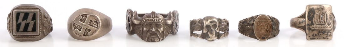 LOT OF 6 WWI WWI GERMAN RINGS SS WIKING: Variety of silver rings mostly Wiking division and SS. Sizes range 6.5 - 11.5 This lot has a reserve.