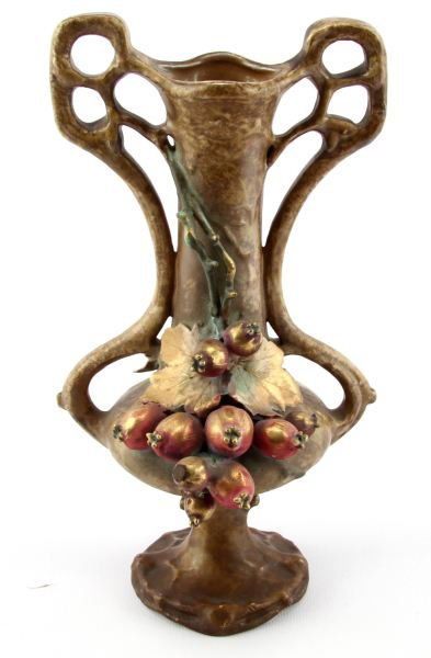 1905-1910 AUSTRIAN AMPHORA GOLDED BERRY VASE: Great art nouveau pottery from Amphora. 10.5 inches tall 5.5 inches across the handles. Two handled form encrusted with berries vines and leaves. Mat glaze with gold hand work. Amphora stamp on bottom