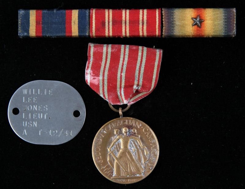 1919 SECOND NICARAGUAN CAMPAIGN NUMBERED MEDAL: Number M. No. 1902, this medal was awarded to LT. Willie Lee Jones USN and is accompanied with his ribbon bar and dog tag, his ribbon bar also has WWI ribbon with silver battle star and Yangtze servic