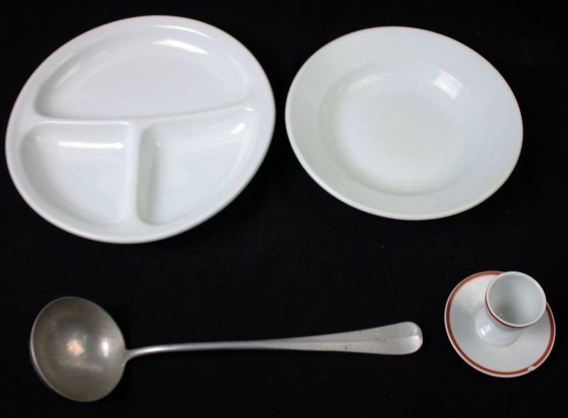 THIRD REICH LW & DAP MESS HALL EGG CUP LADLE BOWL: Luftwaffe egg cup measures 3 by 4 inches, marked "H&C Selb Bavaria Germany Heinrich" and "Fl. U.V. 1944" with the Luftwaffe eagle, cup has one chip on lower plate rim. Luftwaffe Mess Hall Aluminum Lad
