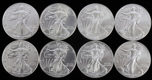LOT 8 MIX DATE 1 OZT SILVER AMERICAN EAGLE COINS
