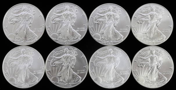 LOT 8 MIX DATE 1 OZT SILVER AMERICAN EAGLE COINS: Lot of EIGHT (8). All Brilliant Uncirculated. This lot reserved at melt.