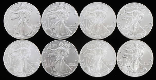 LOT 8 MIX DATE 1 OZT SILVER AMERICAN EAGLE COINS: Lot of EIGHT (8). Brilliant uncirculated. Mixed dates. This lot reserved at melt.