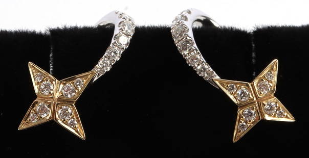 14K TWO-TONE GOLD DIAMOND STAR J HOOP EARRINGS: Diamonds measure between 1.8 millimeters and 1 millimeter. Total weight 2.9 grams. In very good condition with little signs of wear. This lot has a reserve.