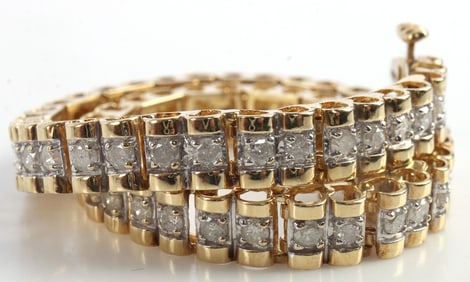 14KT YELLOW GOLD AND DIAMOND TENNIS BRACELET