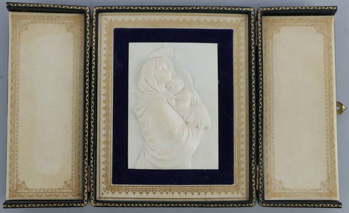 ANTIQUE IVORY PANEL DEPICTING THE MADONNA & CHRIST: Ivory panel depicting the Virgin Mary holding the infant Jesus, both marked with haloes. Includes green and gold case. 5.5 X 6.75 inches. No international shipping. Know your local laws prior to