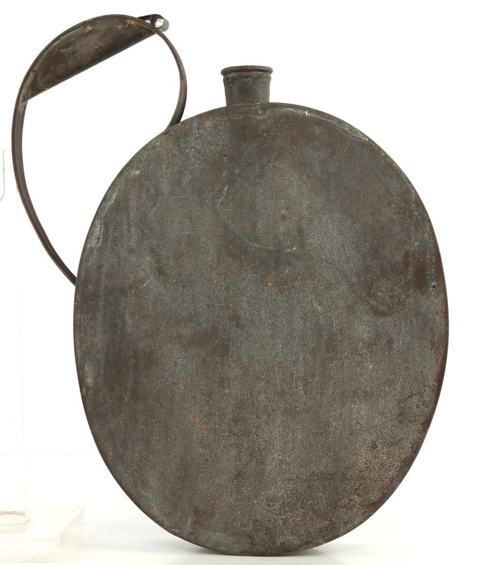 CIVIL WAR CSA CONFEDERATE STATES CANTEEN: Research has caused belief this is a rare CSA canteen, oversize grip, including grip measures 12 X 8 X 1.75 inches. This lot has a reserve.