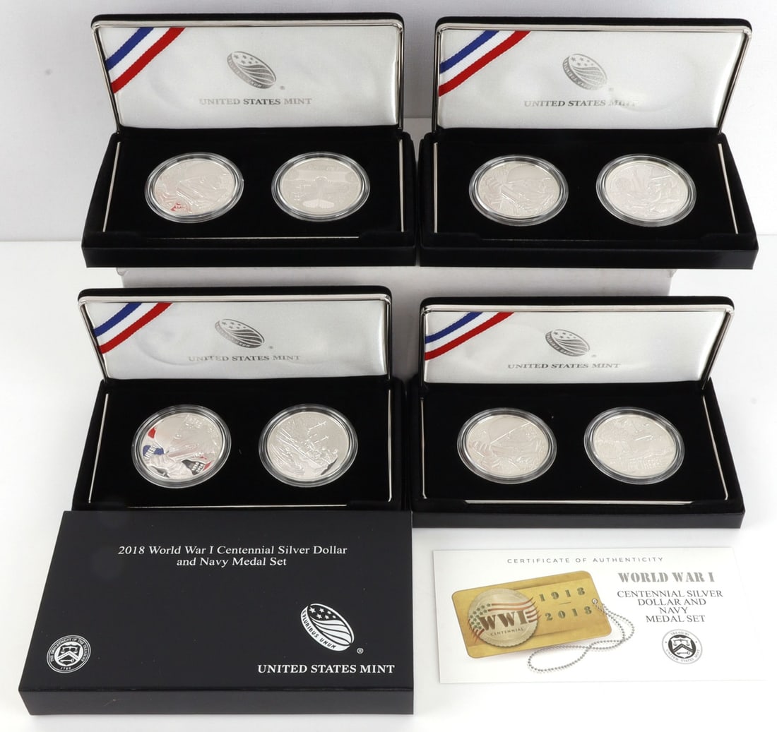 SILVER PROOF COIN & MEDAL WWI ARMY NAVY SETS LOT 4: Four paired commemorative silver coin and medal proof sets in silver, all honoring WWI service. Military branches commemorated include the Army, the Air Service, the Navy, and the Coast Guard. Each co