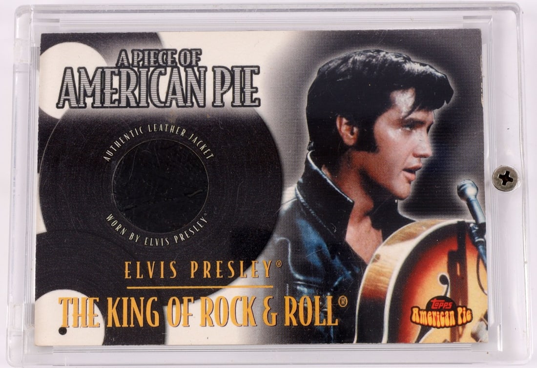 PIECE OF ELVIS PRESLEY JACKET IN TOPPS CARD: Portion of a jacket worn by American musician Elvis Presley, contained within a Topps Card, part of their American Pie series of history-centric memorabilia. Deemed authentic according to terms. Very 