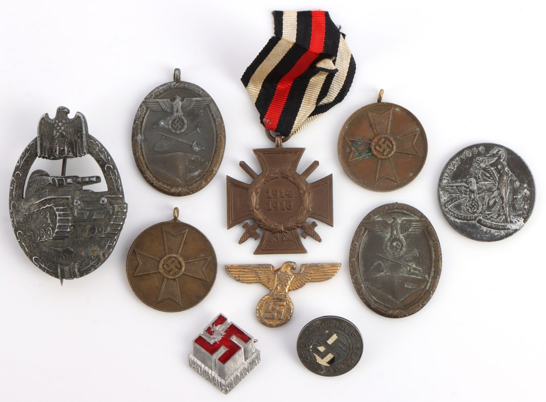LOT OF 10 WWII GERMAN REICH MEDALS & BADGES: Lot of TEN (10) features a WWI service cross, West Wall medals, Tank badge, and party pins. Very good condition. Unauthenticated, sold "as is."