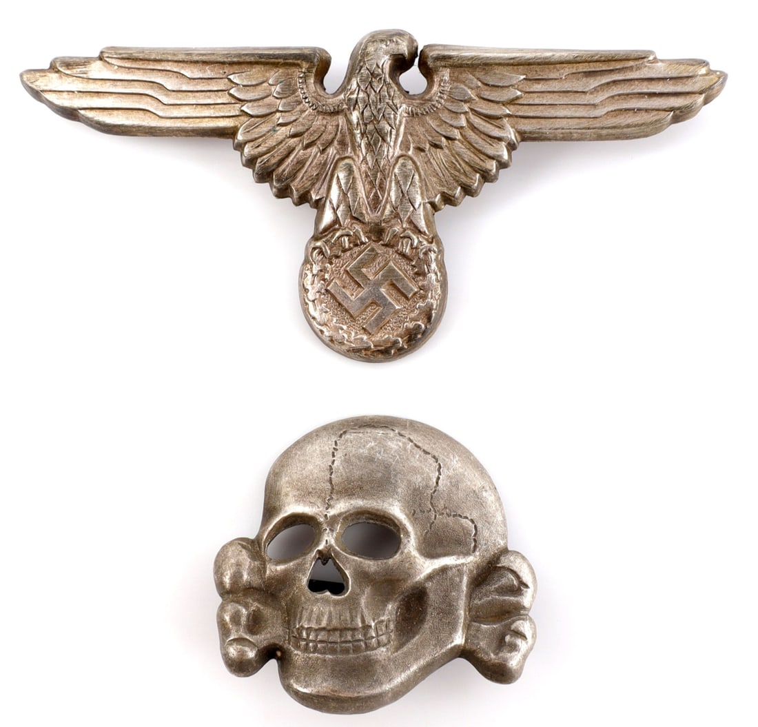 WWII GERMAN REICH SS VISOR SET TOTENKOPF AND EAGLE: Early silver type totenkopf and eagle. Eagle marked M1/8, totenkopf marked D.S & M. Measure 2.75 and 1 inches. This lot has a reserve.
