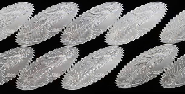 LOT 8 SILVER AMERICAN EAGLE .999 FINE 1 OZT COINS: Lot of EIGHT (8). Brilliant uncirculated. All mixed dates. This lot reserves at melt.