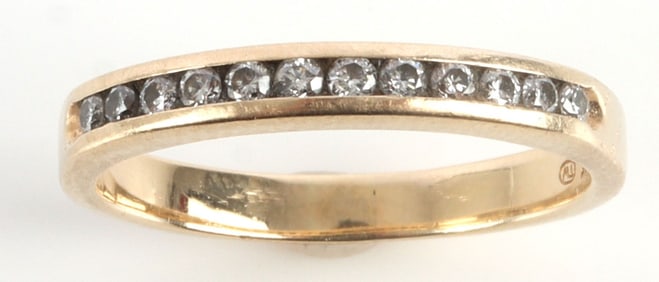 14KT YELLOW GOLD CHANNEL SET DIAMOND RING
