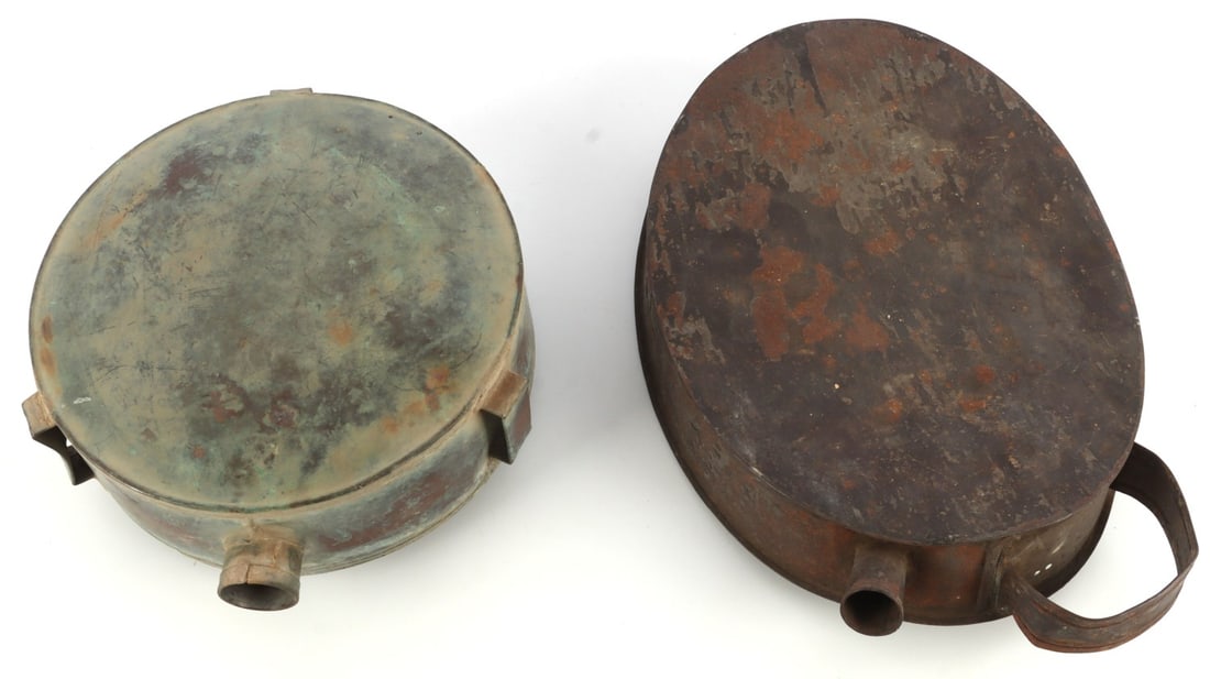 LOT OF 2 US CIVIL WAR MEDICAL CANTEENS: Lot of TWO (2) pieces. Includes large tinned iron medical canteen with handle (11.5X7.5 inches) and flat-sided copper canteen with three strap loops (diameter 7.25 inches). Both in good overall condit