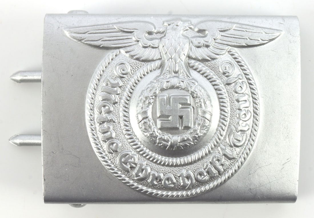 WWII GERMAN THIRD REICH SS EM ENLISTED BUCKLE: EM belt buckle. One-piece mold. Marked RZM 822/38 SS. Rare variant. 2.5 inches. This lot has a reserve.