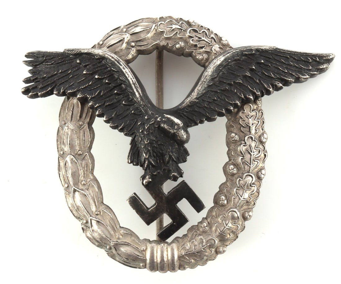 WWII GERMAN REICH LUFTWAFFE PILOT BADGE: C.E. Junker make. High domed rivets on the wreath. 1 7/8 inches. Very good condition. This lot has a reserve.